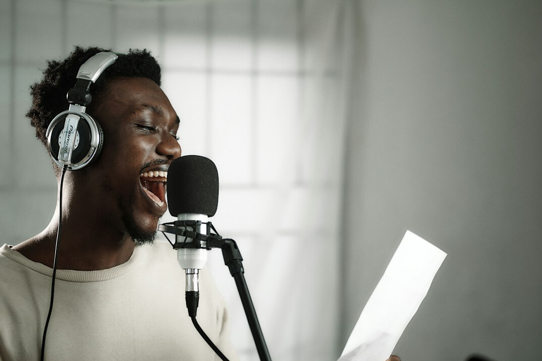 person practicing voice exercises
